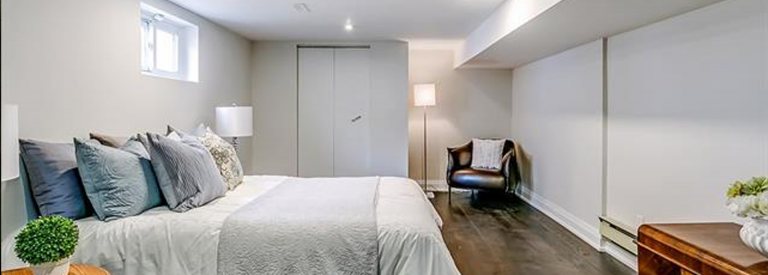 White Painted Basement Bedroom
