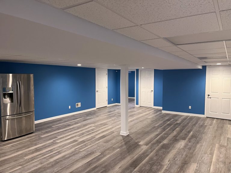 Blue Walls With White Trim in Basement