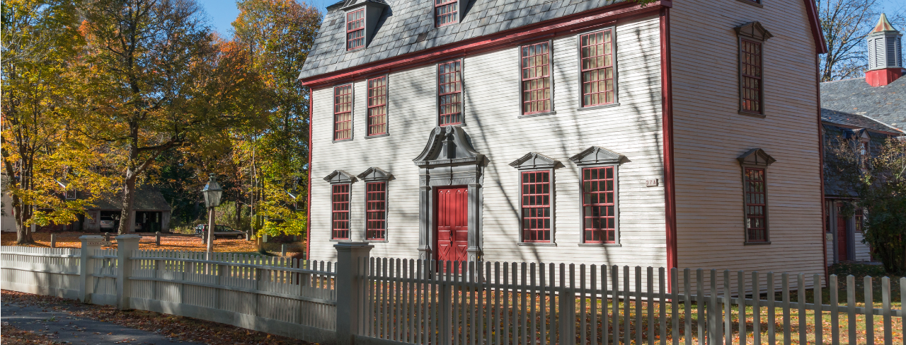 white historic home for historic home renovation and painting