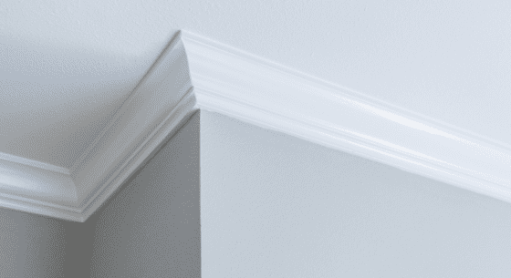 traditional crown molding on grey walls