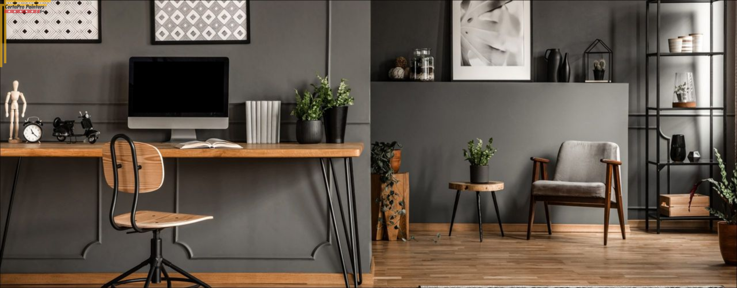 wood and metal desk and shelves in room with dark grey walls