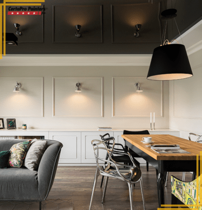 home interior wall with wall sconces and dark upper walls