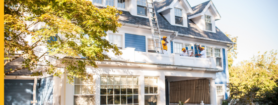 certapro painters team members painting home exterior