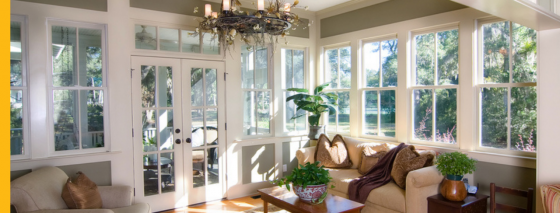 Sunroom with light green painted wall interiors