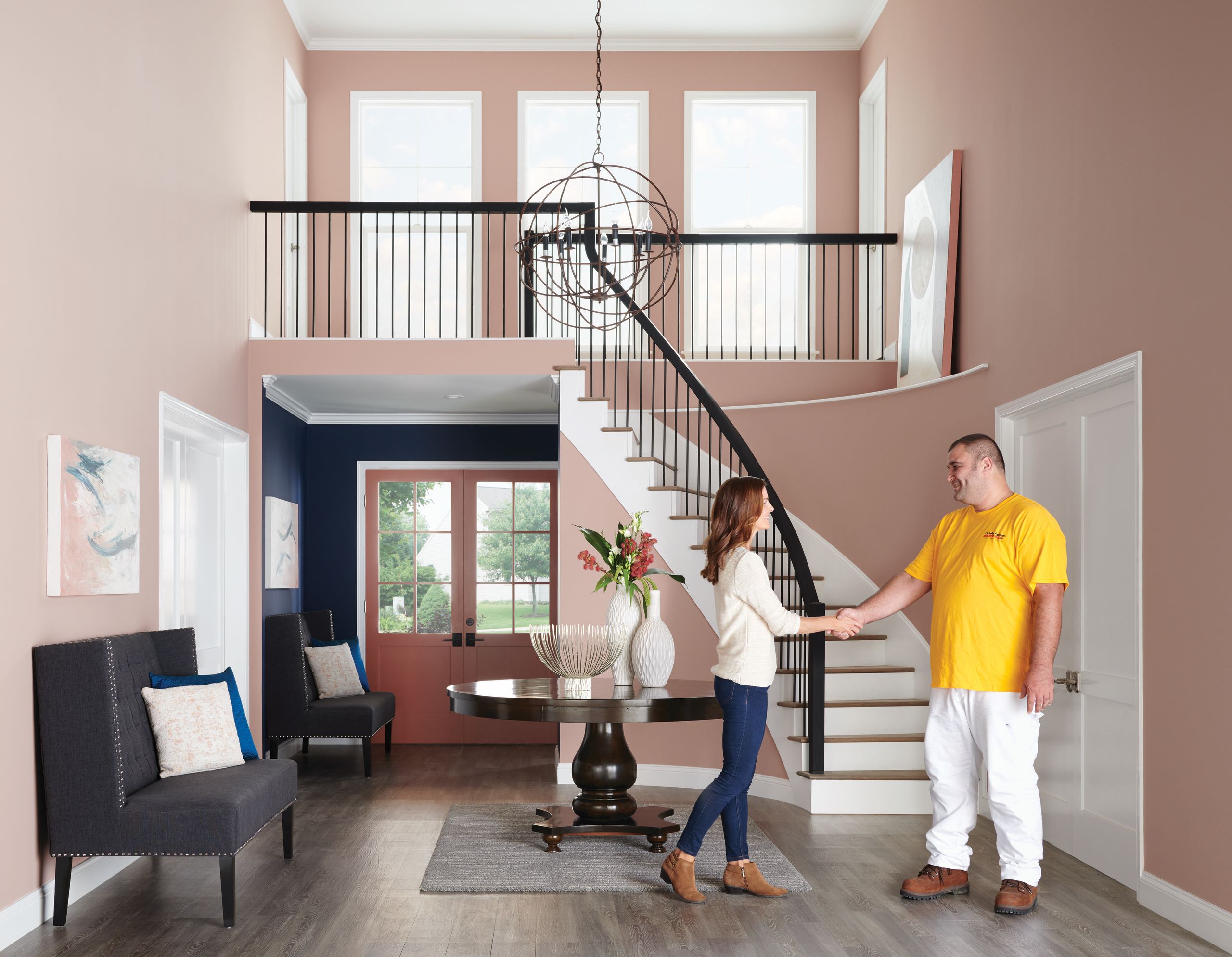 estimate being given in foyer of home