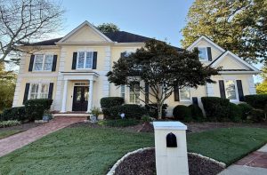 yellow home in dunwoody before being painted