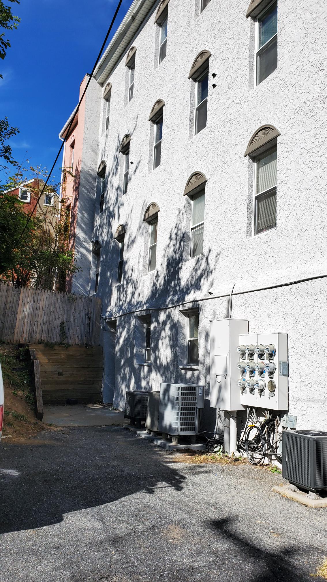 Side Angle of River Rock Management after completed commercial exterior painting project by CertaPro Painters of the Greater Lehigh Valley - Angle 2