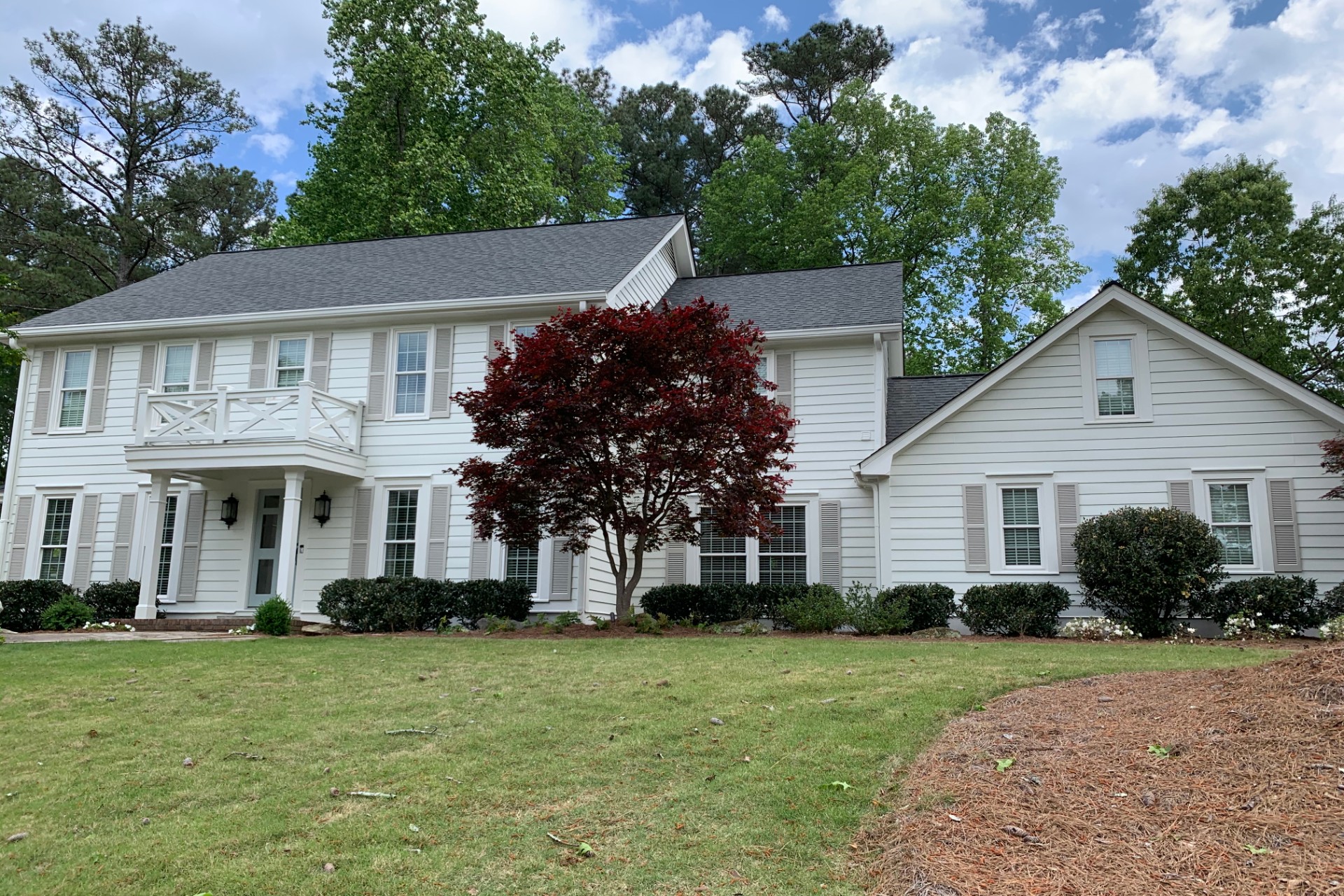 Colonial home after repainting