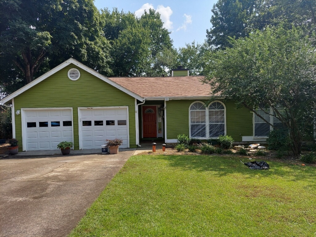 exterior of a home before repainting