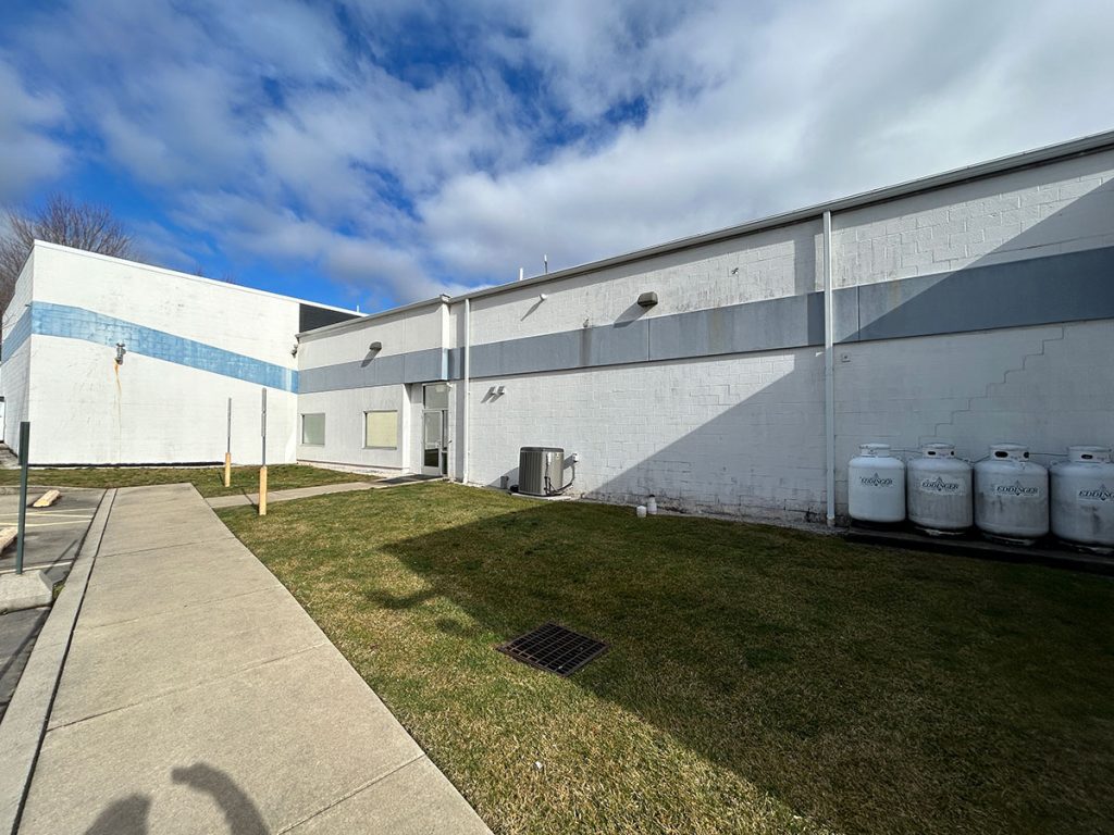 home city ice commercial exterior painting (before)