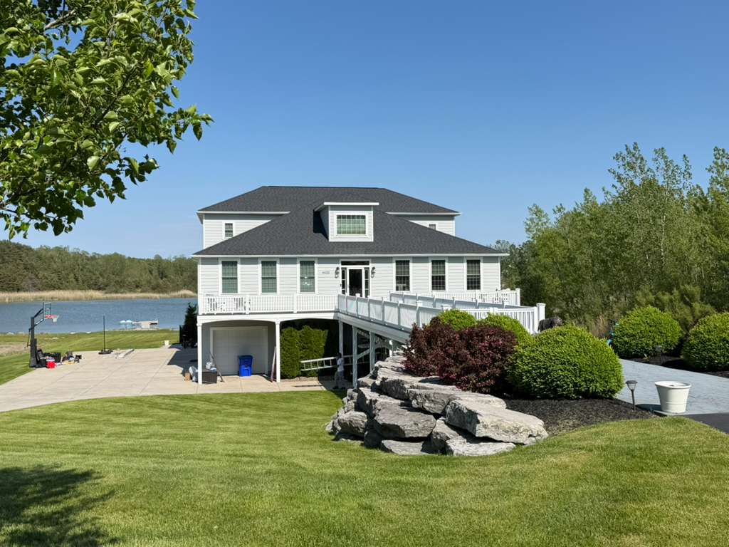 house exterior with repainted wooden siding
