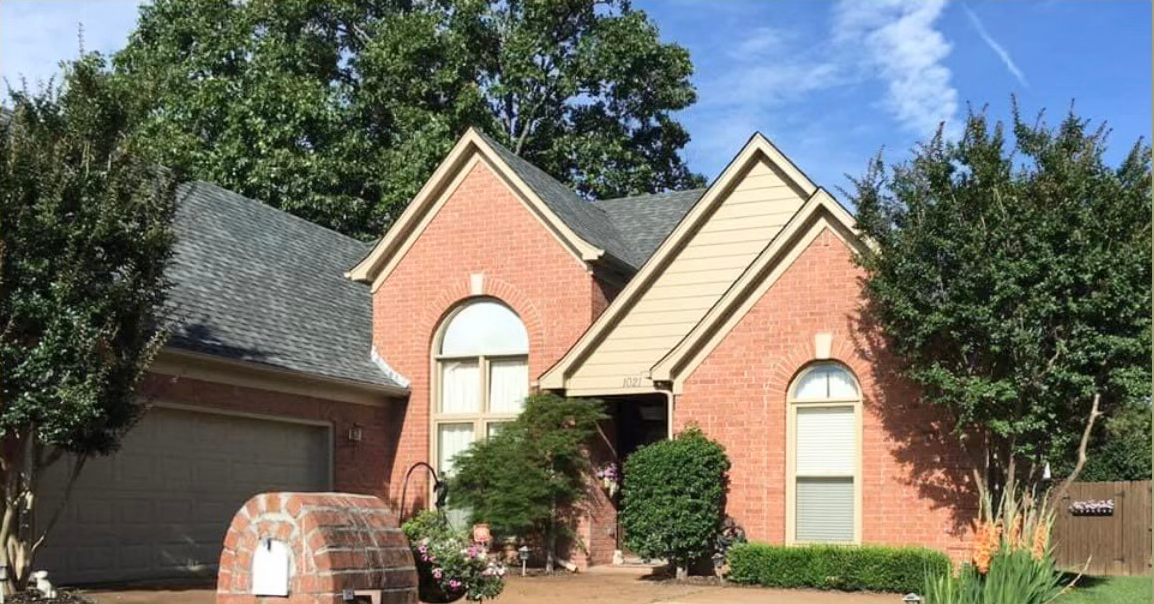 Before brick house painting in Bartlett.