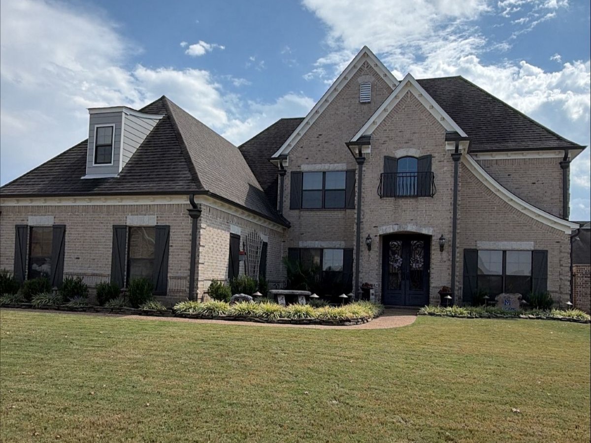house exterior after dark brown shutter repaint