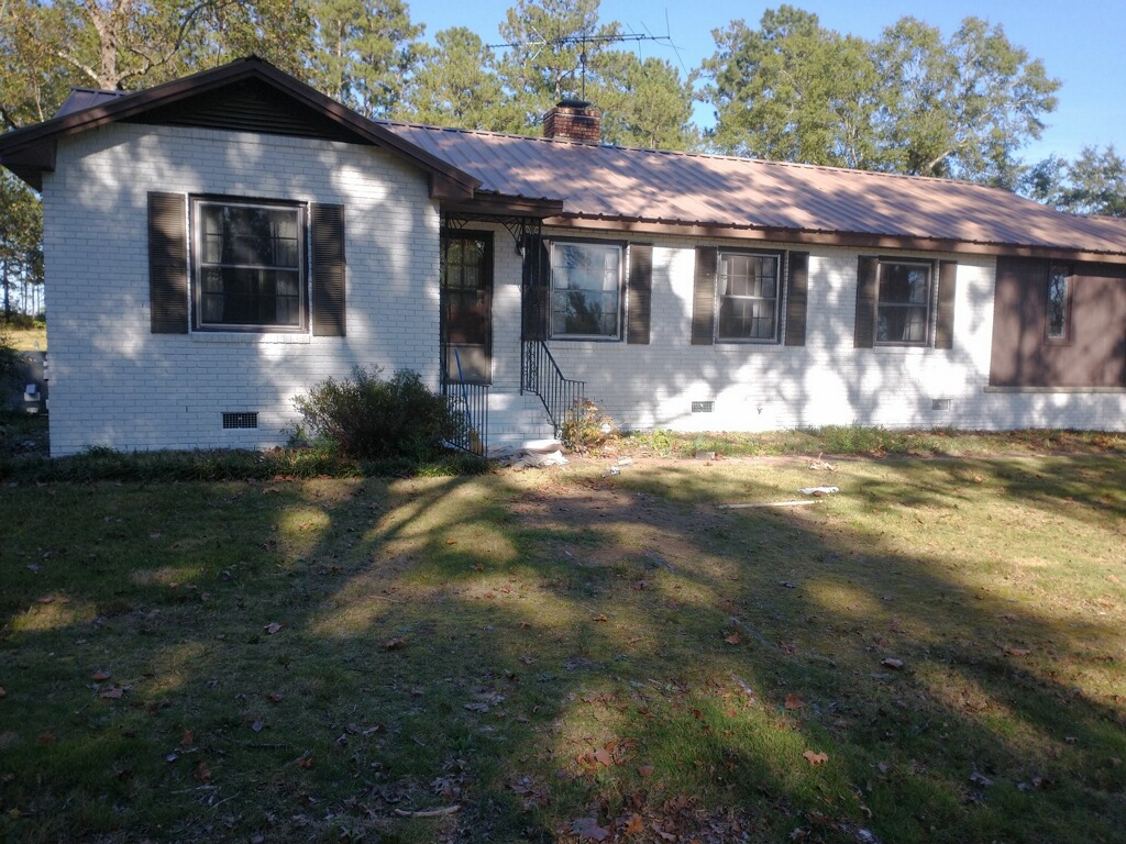 white brick home