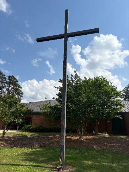 wooden cross with peeling paint