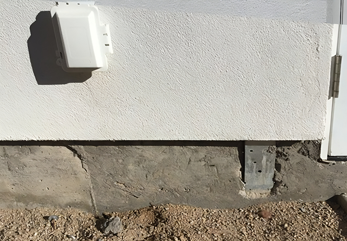 Worn Down Exterior Repaired & Repainted Before