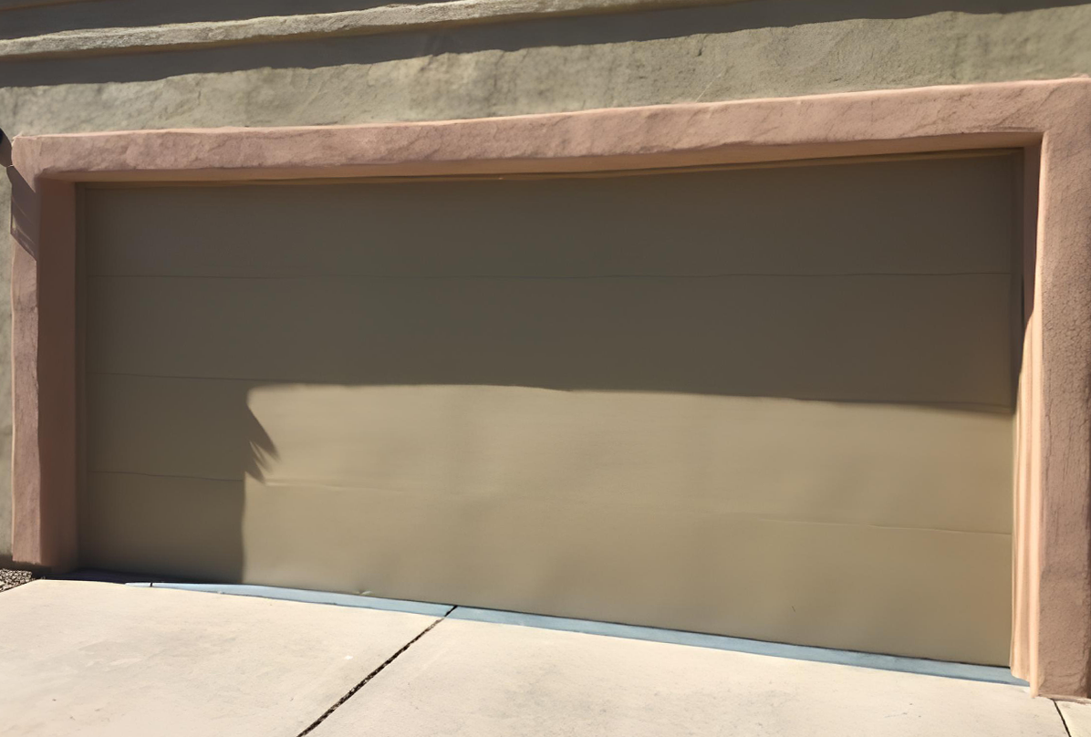 Bland Brown Garage Repainted Vibrant White Before