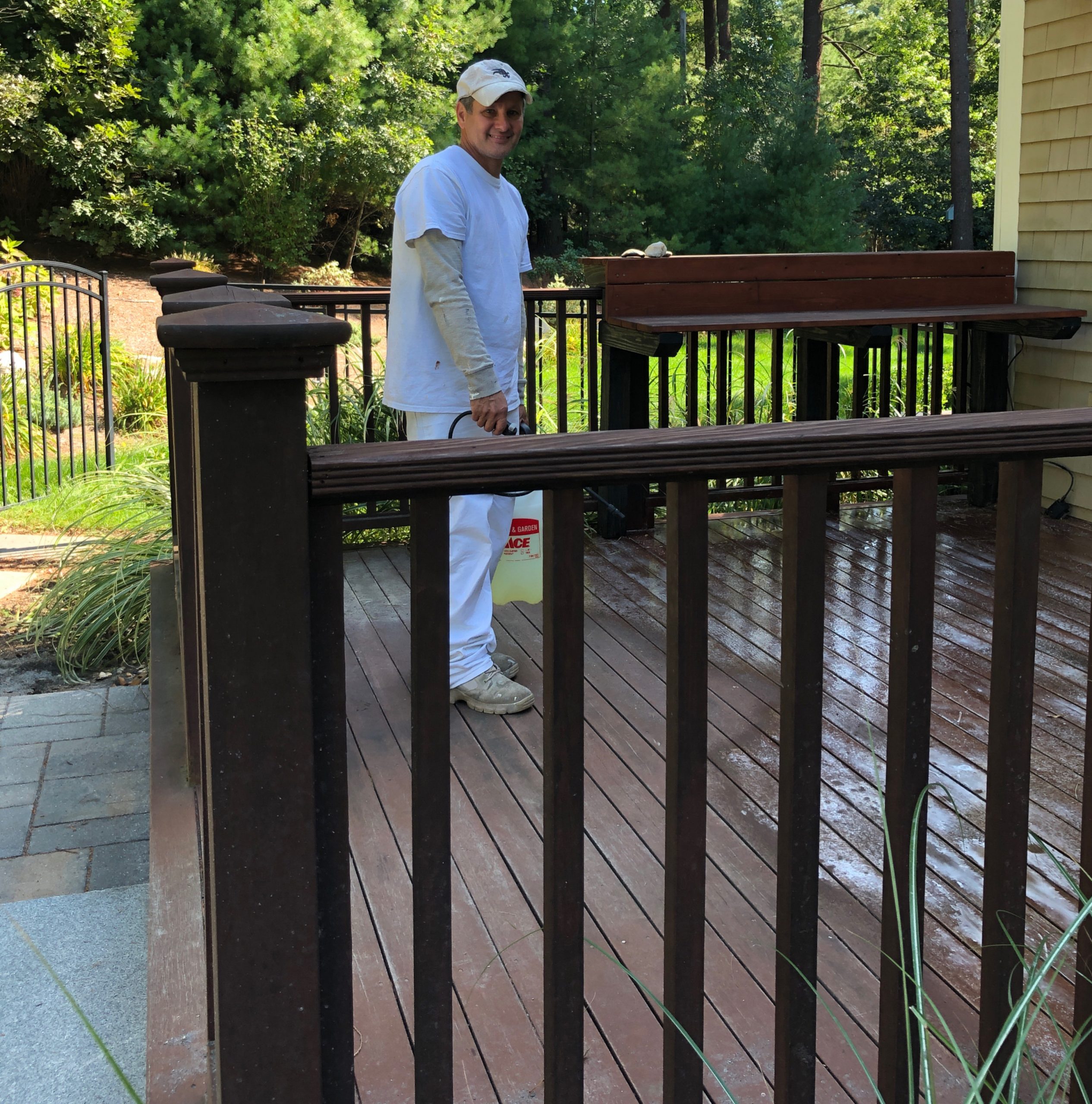 certapro worker working on deck