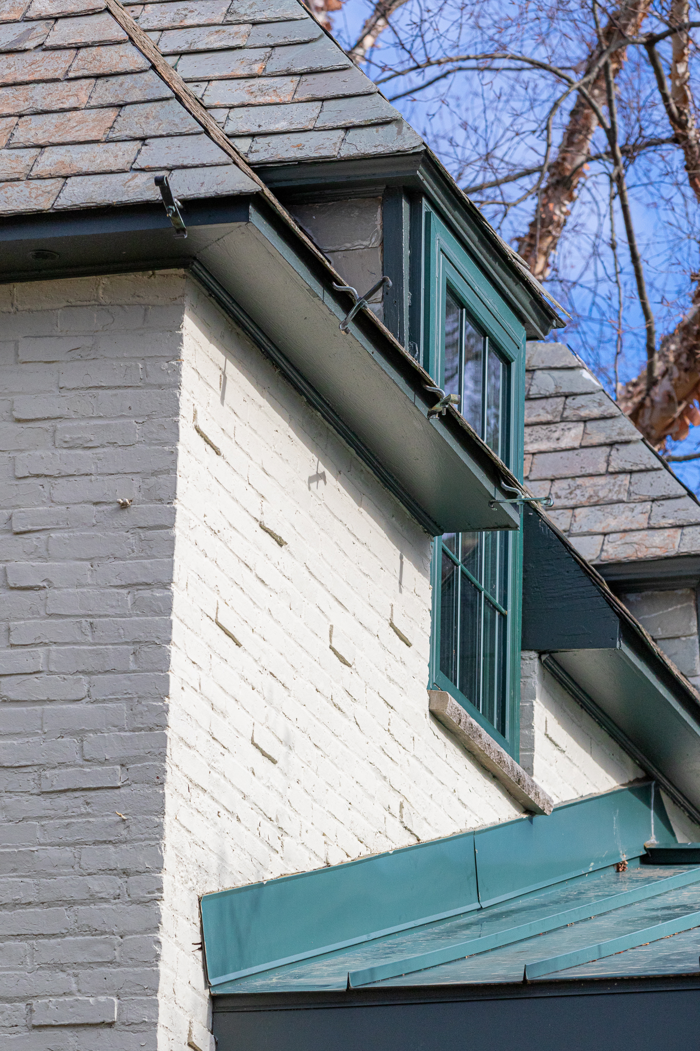 close view of painted soffits and window trim