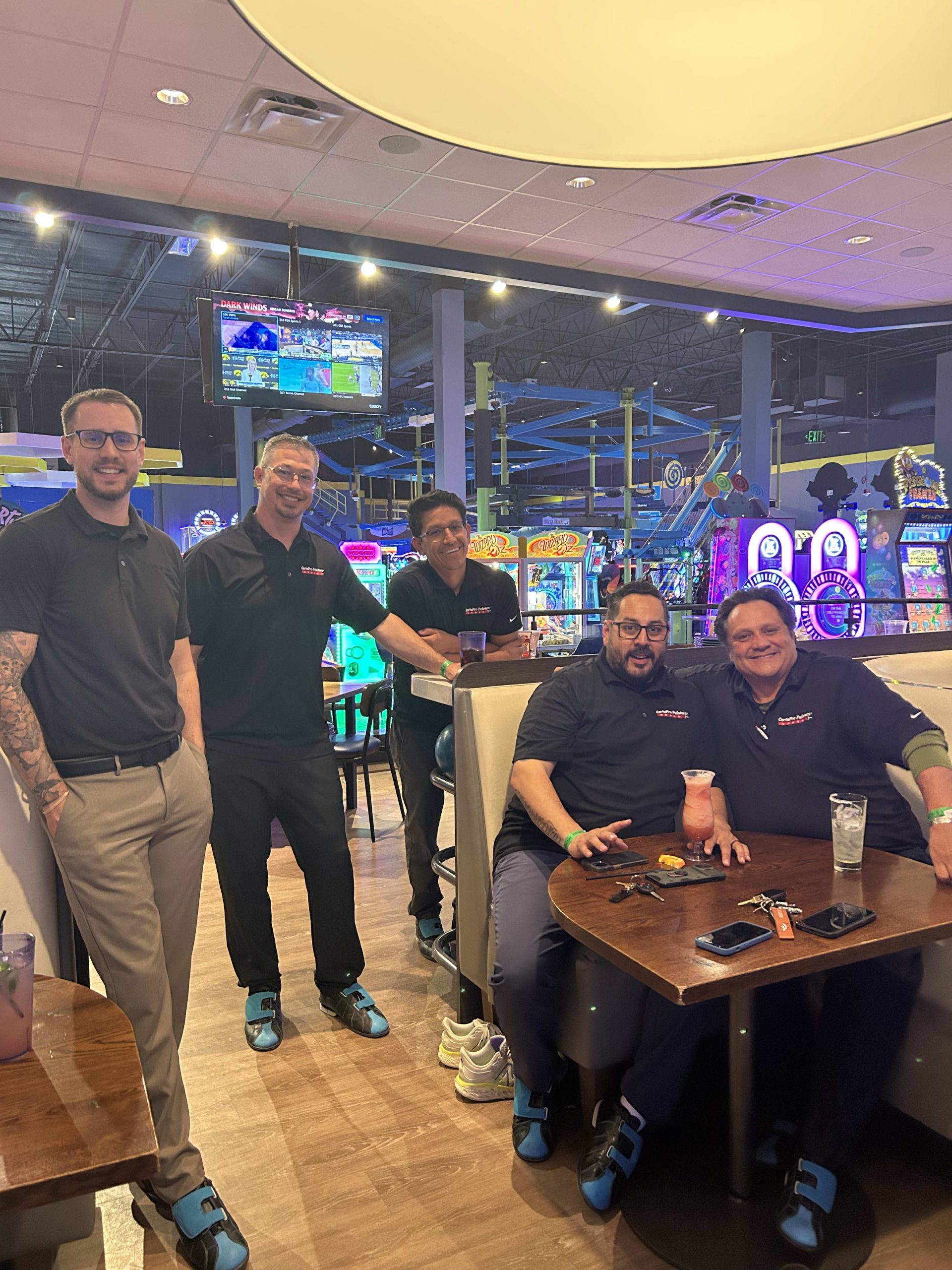 group of adults at bowling alley