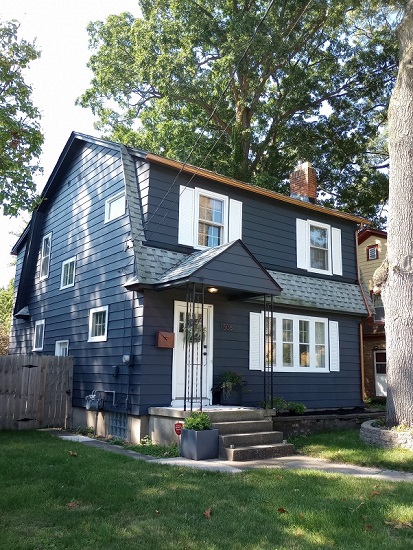 After photo - front blue house white trim