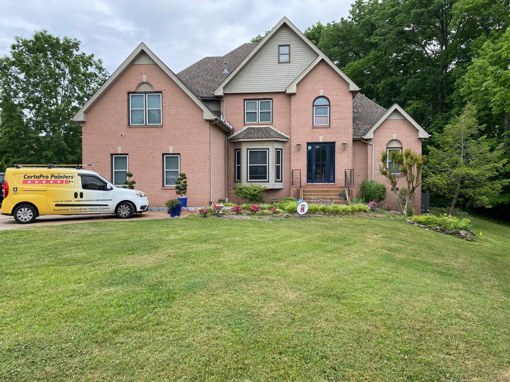 Front of brick home (before)