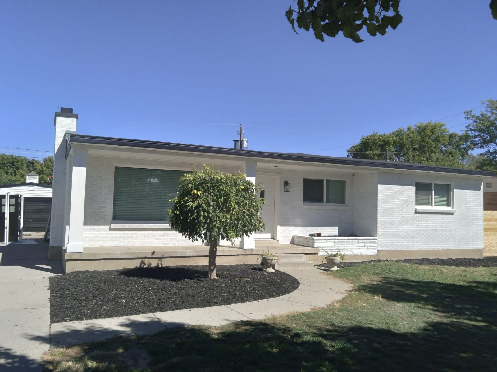 After brick house painting.