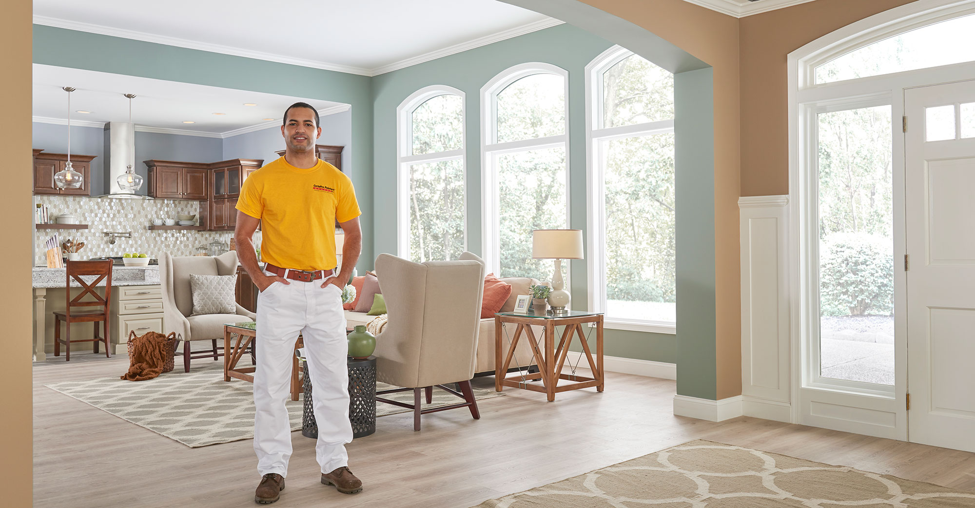CertaPro crew member standing in a completed residential interior