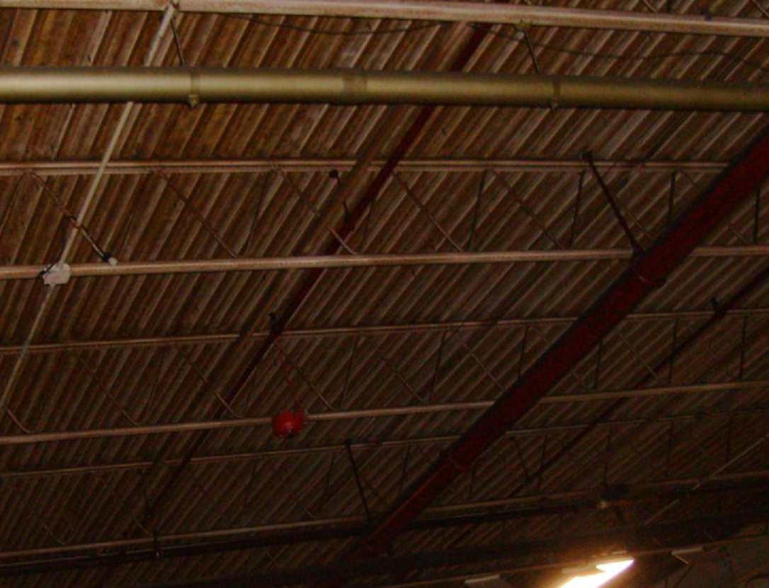 Rust Removal & Warehouse Repaint Before