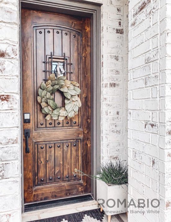 limewashed brick home entryway