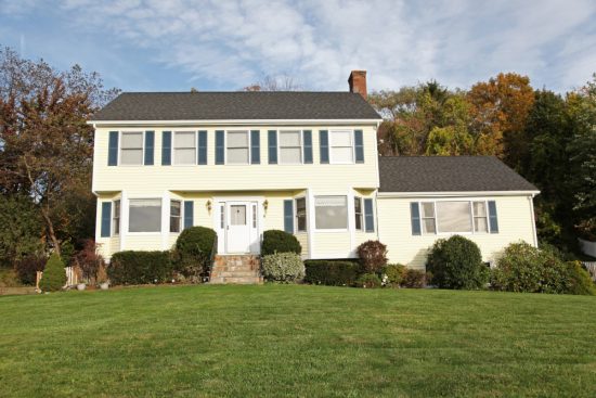 exterior house painters completed this colonial home repainting project.