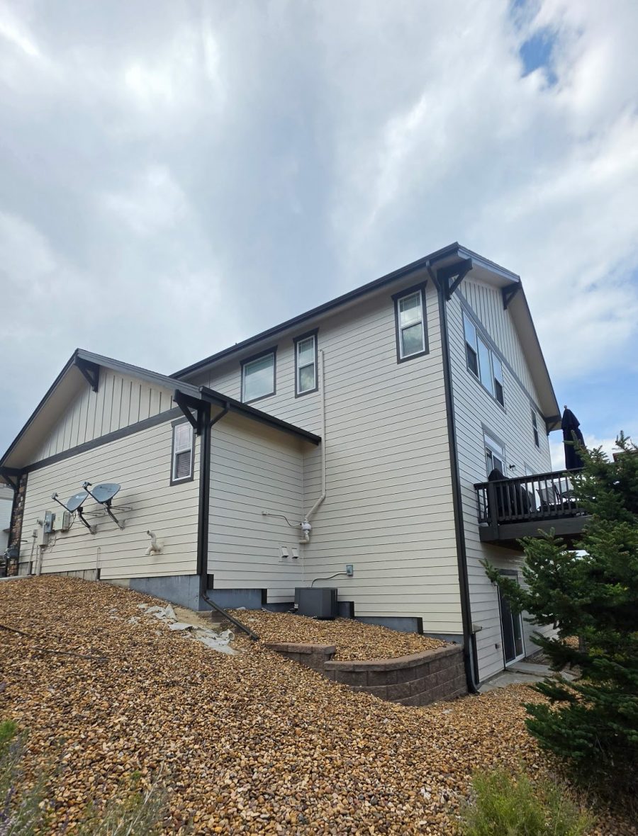 Before exterior color change showing the side and rear exterior of a Castle Rock home Preview Image 1