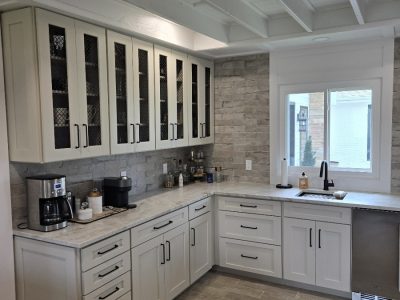 kitchen with white cabinets and granite countertops