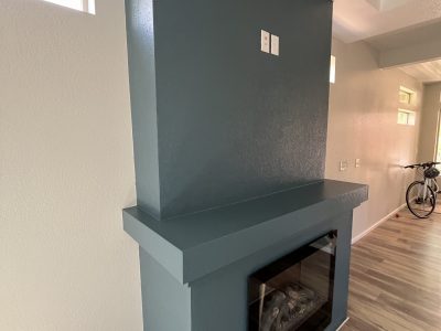 blue painted mantle in home