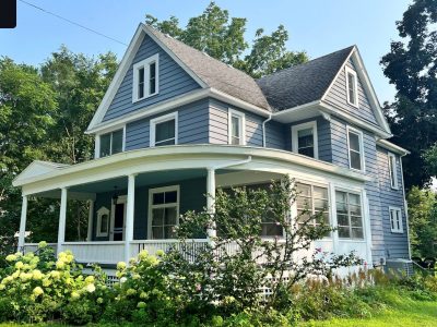 blue painted farmhouse exterior