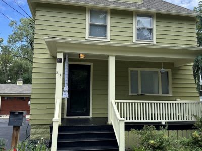 green painted house exterior