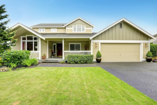 Painted exterior of ranch house with trim