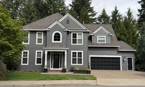 Deep Charcoal Siding, Portico, and Black Garage Door Repaint