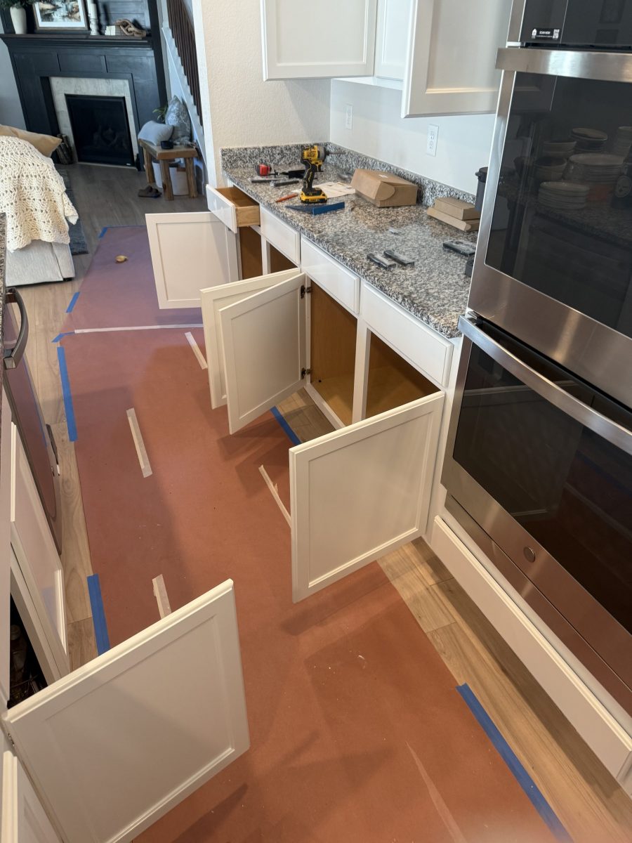 kitchen interior with paper floor covering during cabinet repaint Preview Image 8