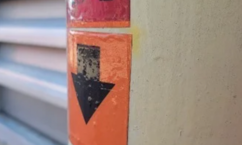 Costco Pipe Identifier Stickers on the pipes (BEFORE)