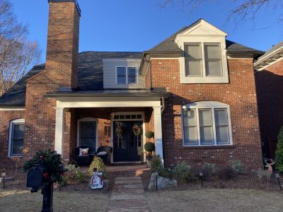 front of brick house after painting
