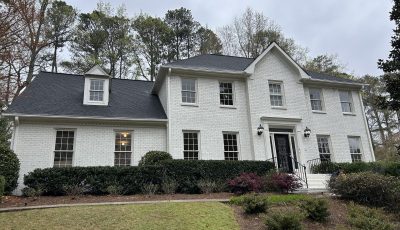 brick home painting white