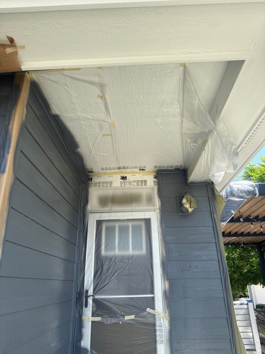 house with protective coverings for painting Preview Image 9