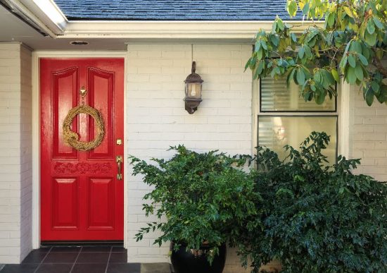 white painted brick home entrance
