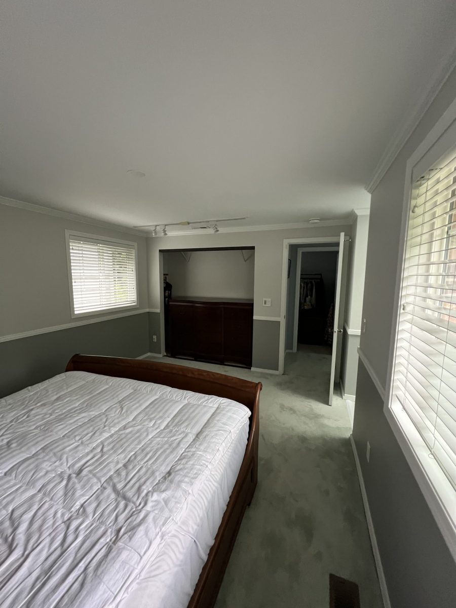 freshly painted bedroom with two tones and white trim Preview Image 2