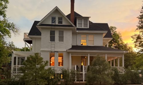 Historic Home Exterior Repaint with White Finish