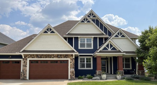 Blue and red house exterior finished painting project CertaPro