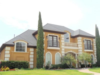 Exterior house painting by CertaPro painters in Plano, TX