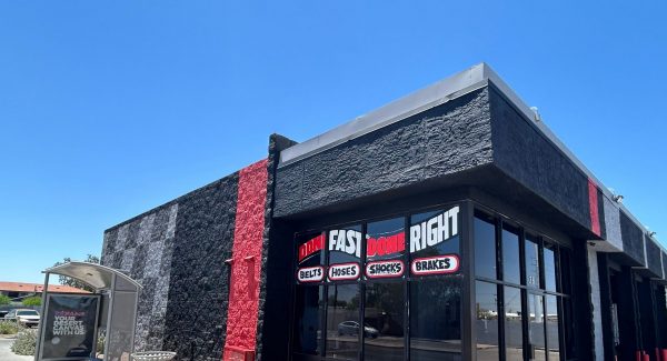 checkerboard pattern painted auto shop exterior