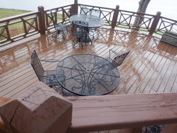 multi-level wooden deck with two sets of patio furniture Preview Image 9